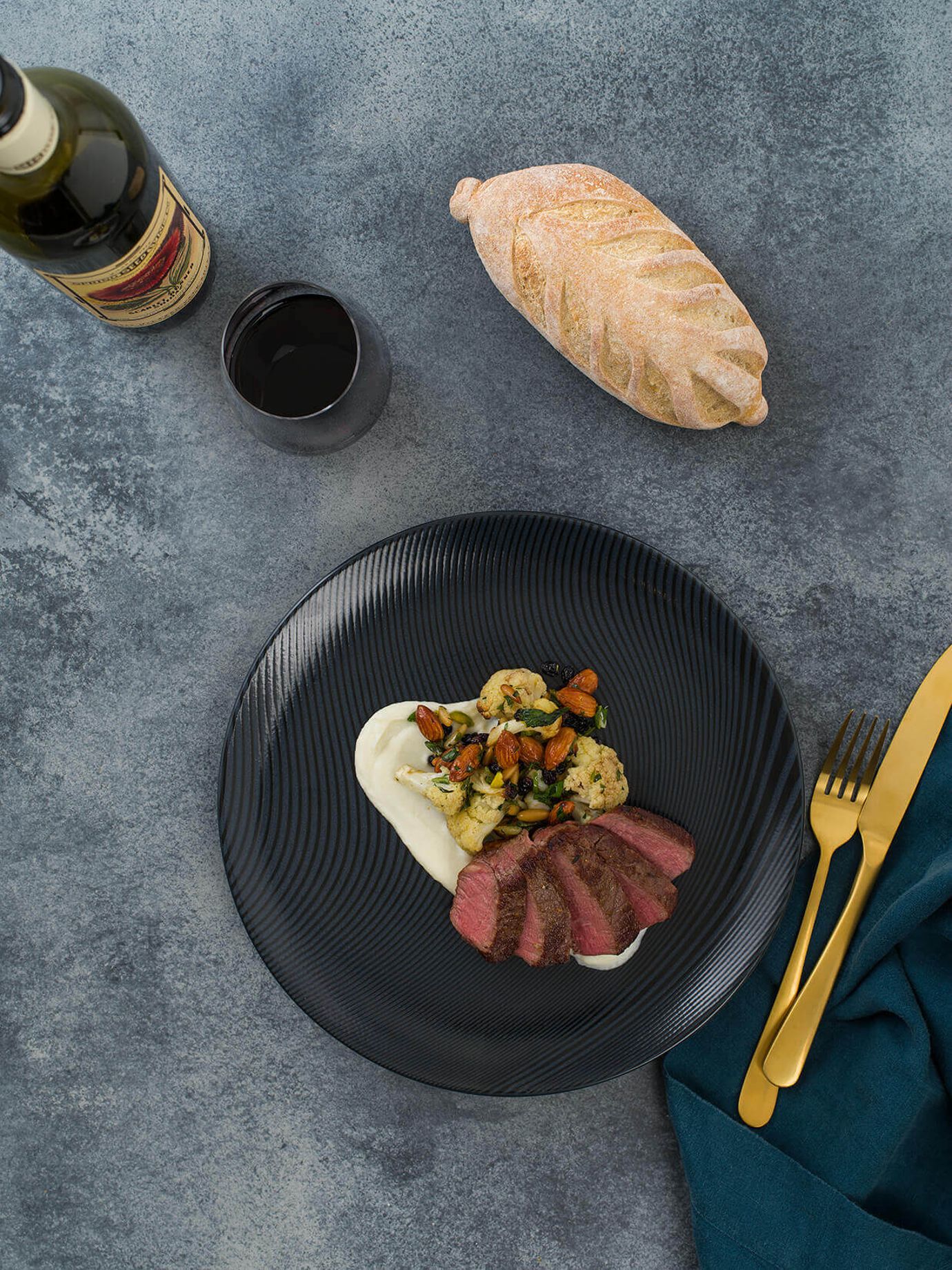 Sous-vide eye fillet, cauliflower puree and salad