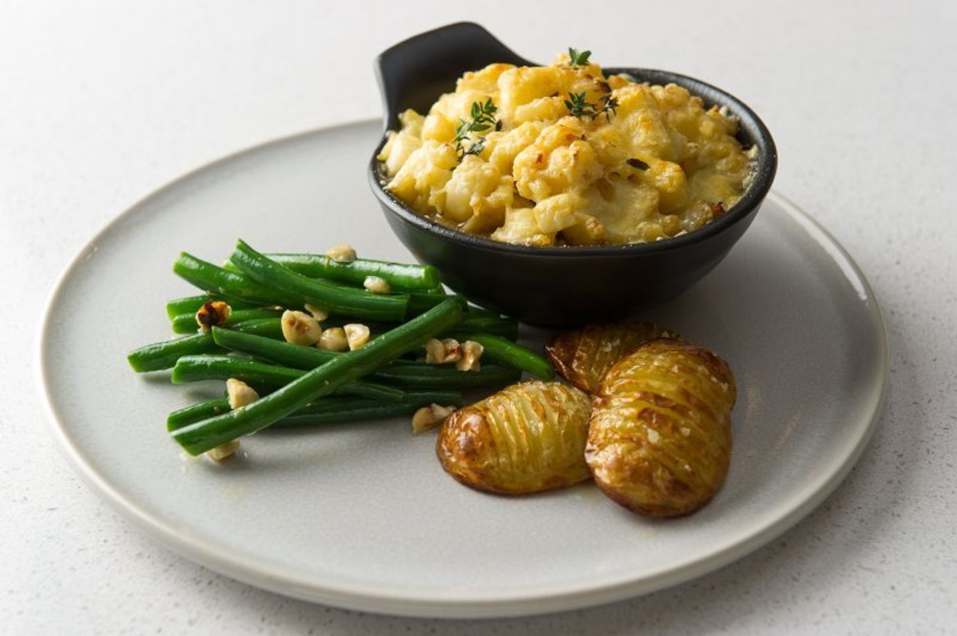Beef shin, bacon and red wine pie with smashed celeriac topping