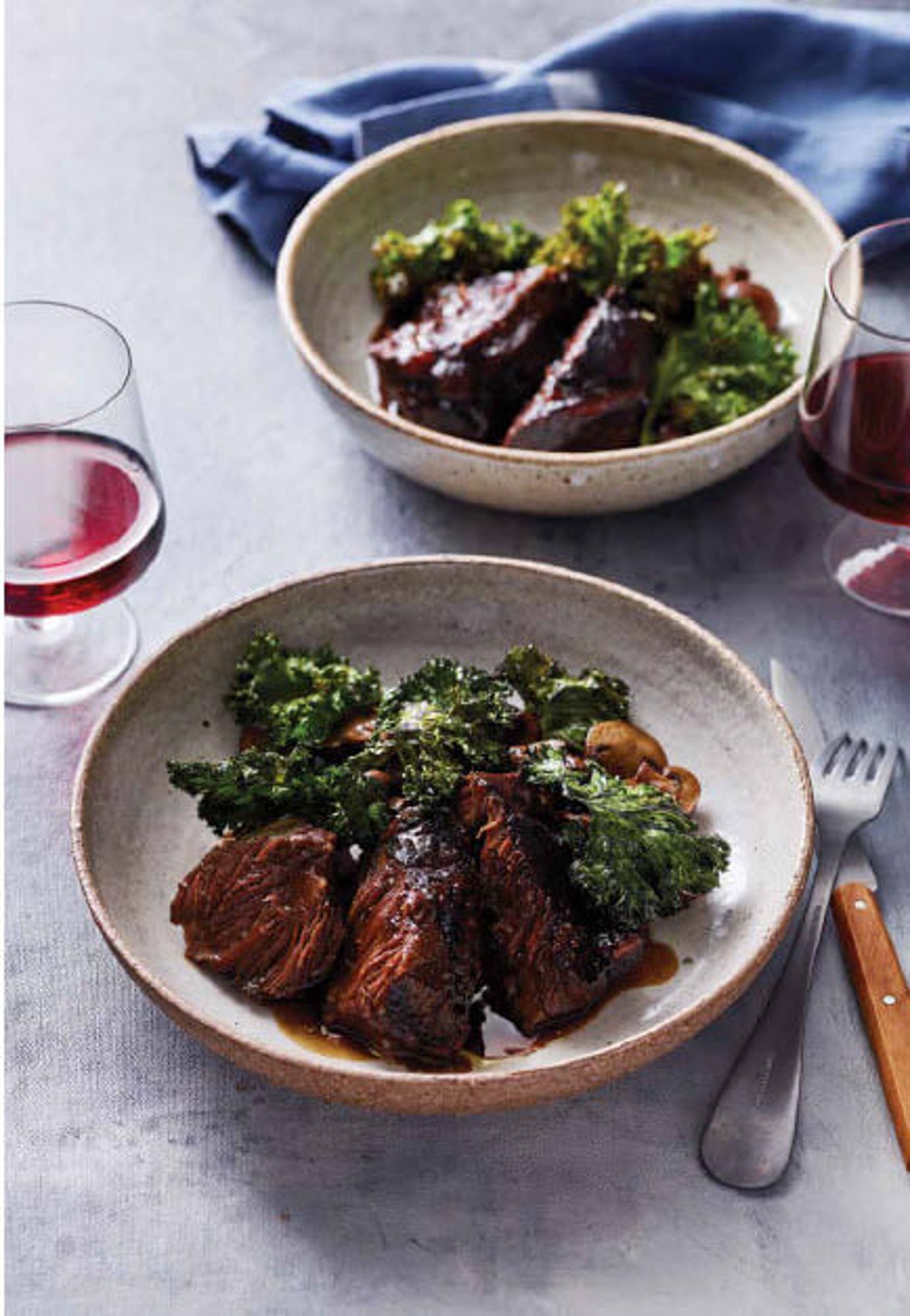 Beef cheek with kale and mushrooms
