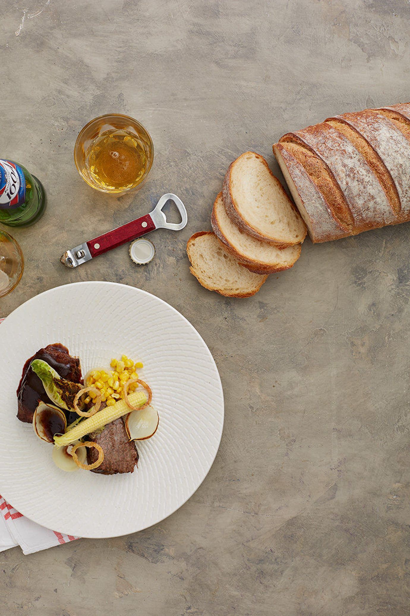 Beef short ribs with corn and onions