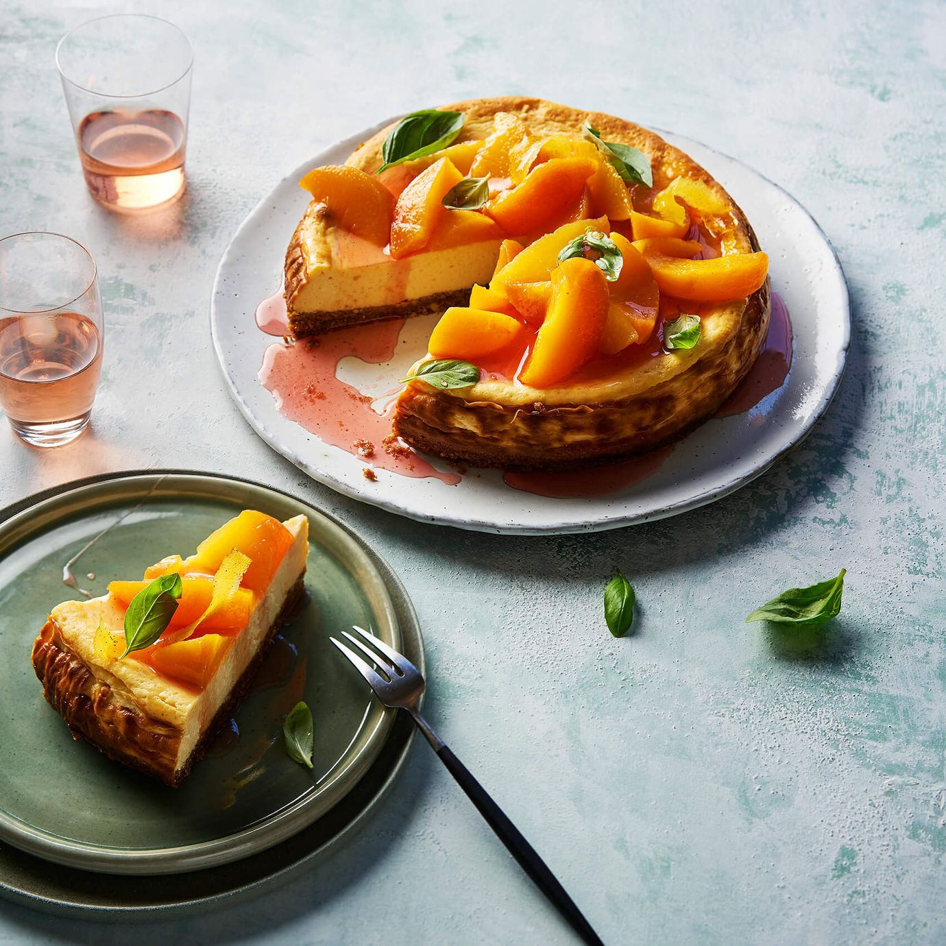 Goat's cheesecake with poached stone fruit in basil syrup