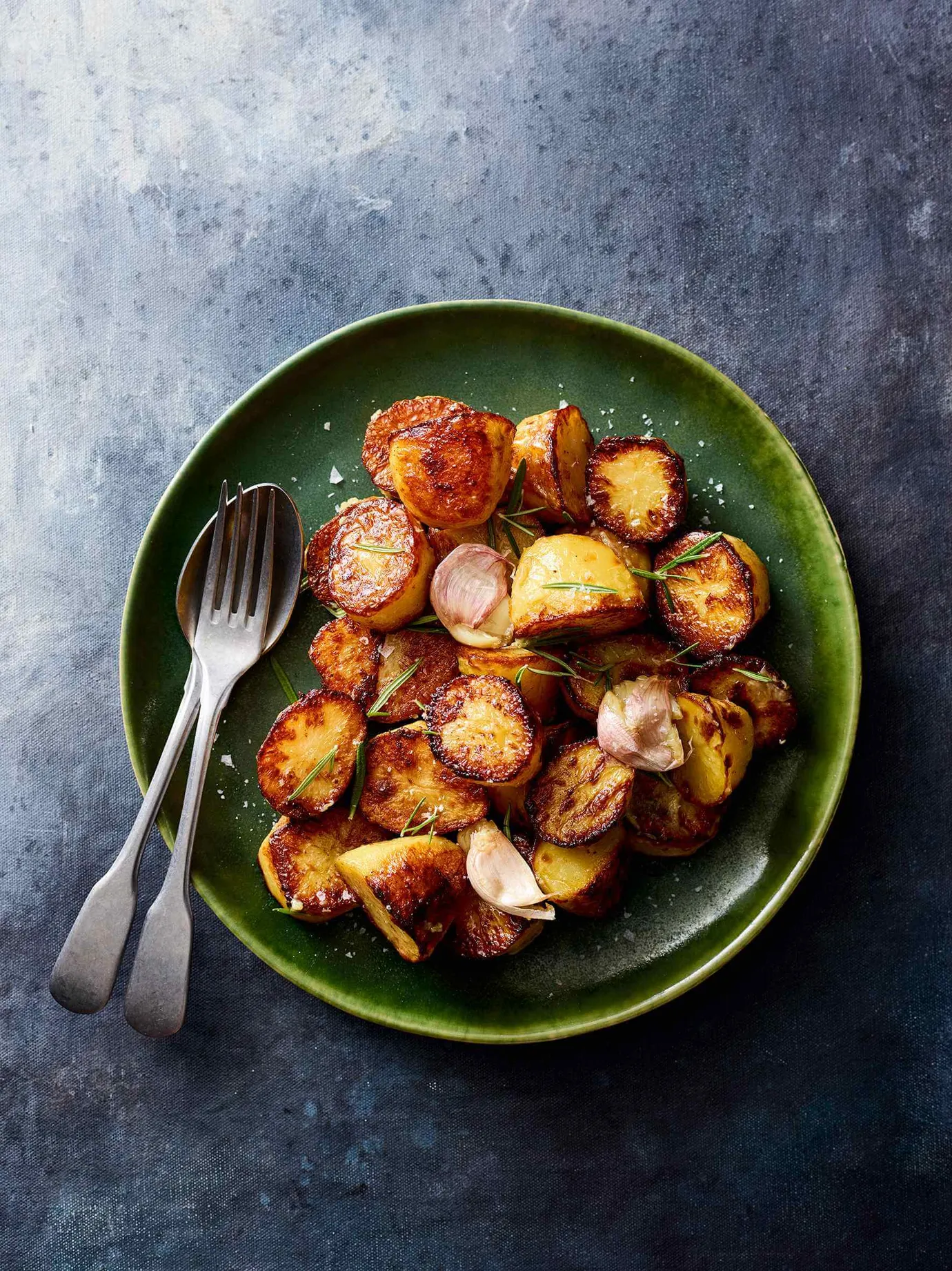 Roasted potatoes with confit garlic and rosemary