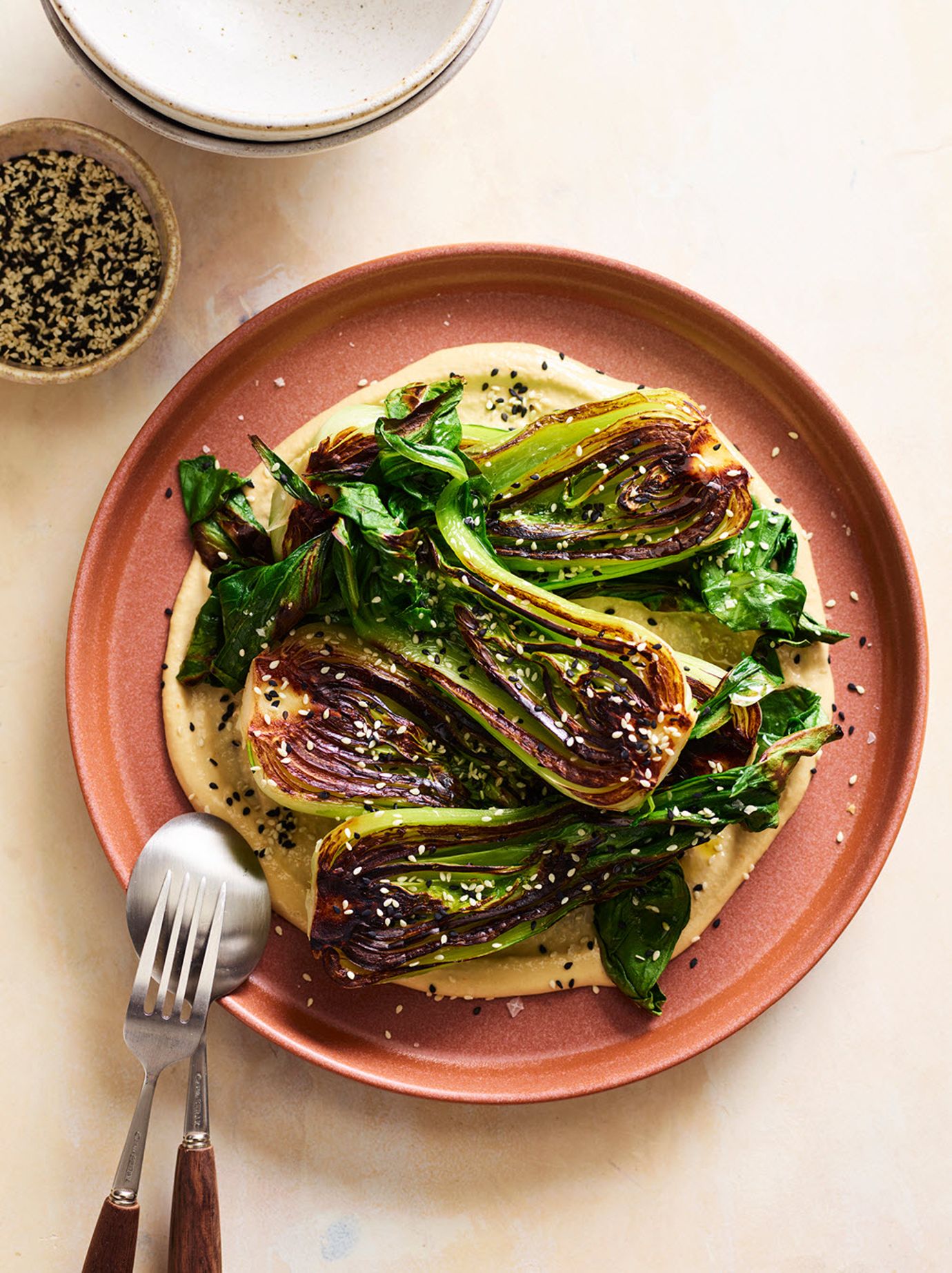 Blackened bok choy with sesame and orange sauce