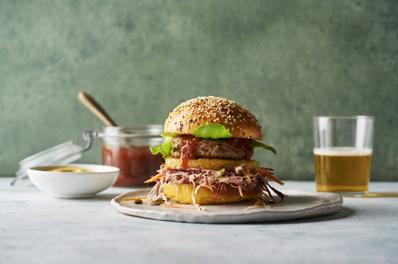 Beef and pork burger with pumpkin seed slaw