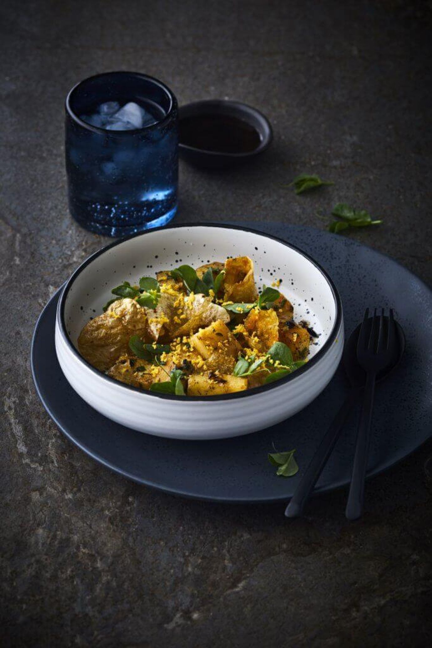 Potato gnocchi with black garlic and salted yolk