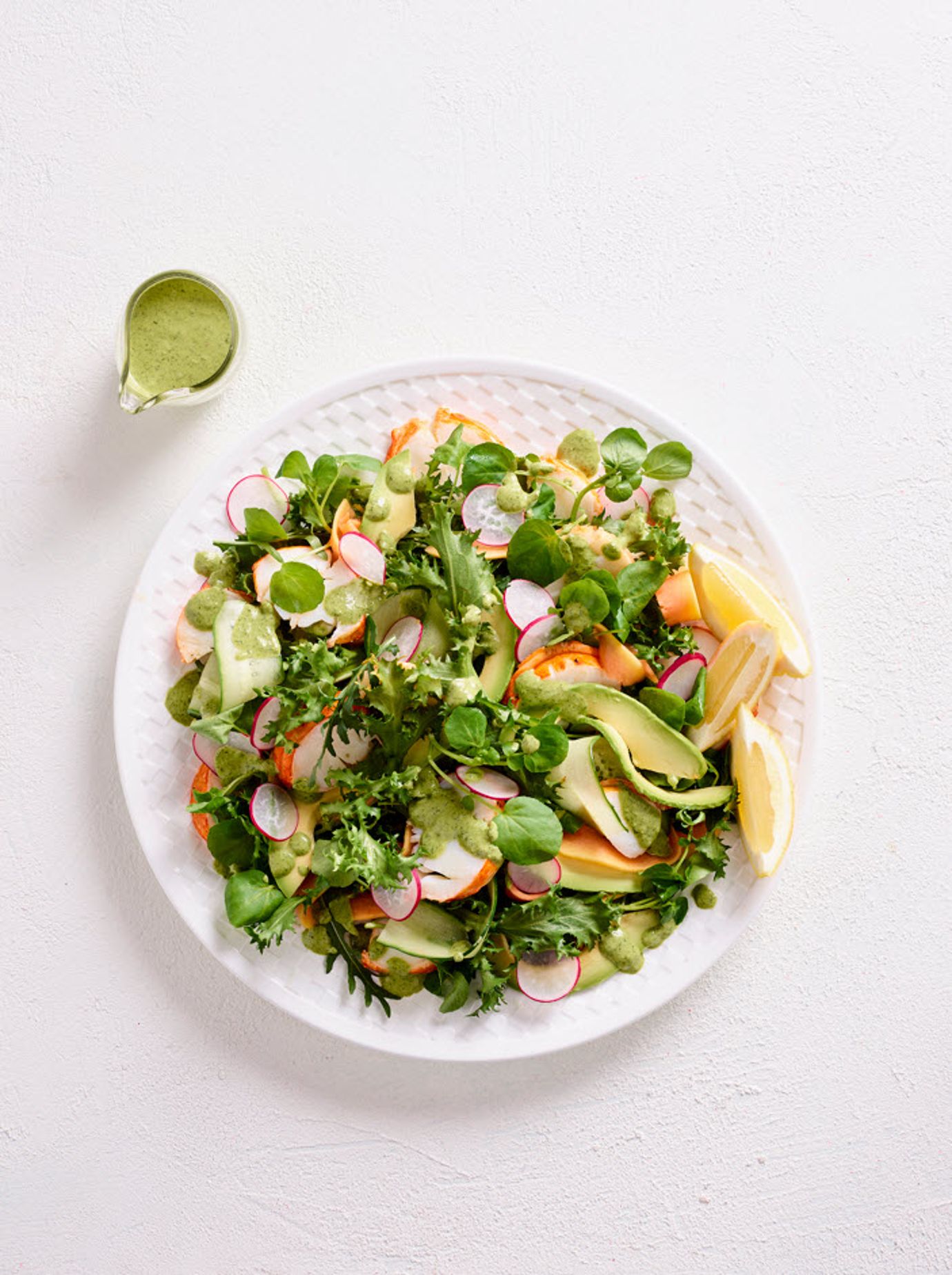 Char-grilled seafood and mango salad with green goddess dressing