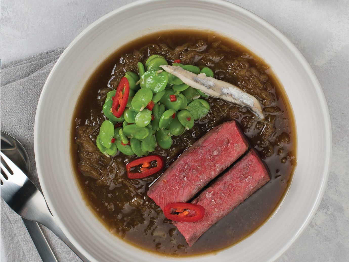 Steamed lamb in onion sauce