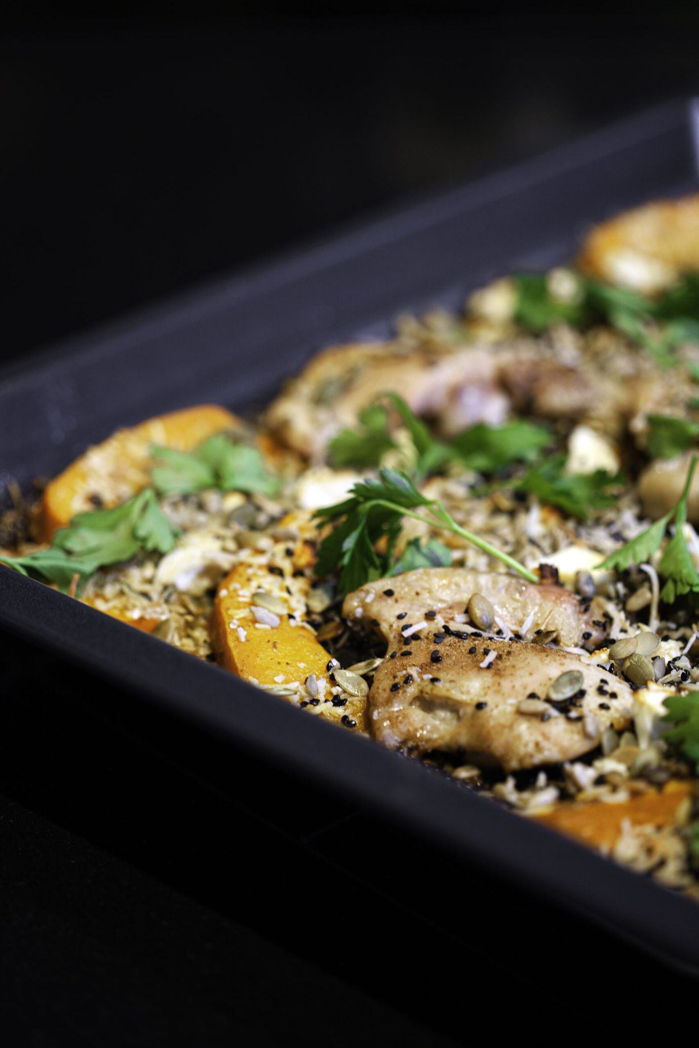 Chicken tray bake with butternut squash, coconut, lentils, seeds and feta