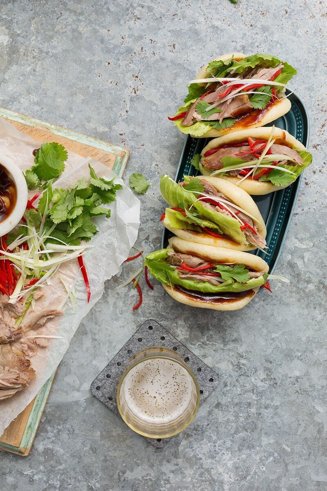 Steamed bao buns with confit duck