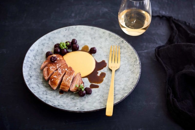 Sous-vide duck breast, sweet corn and pickled cherries