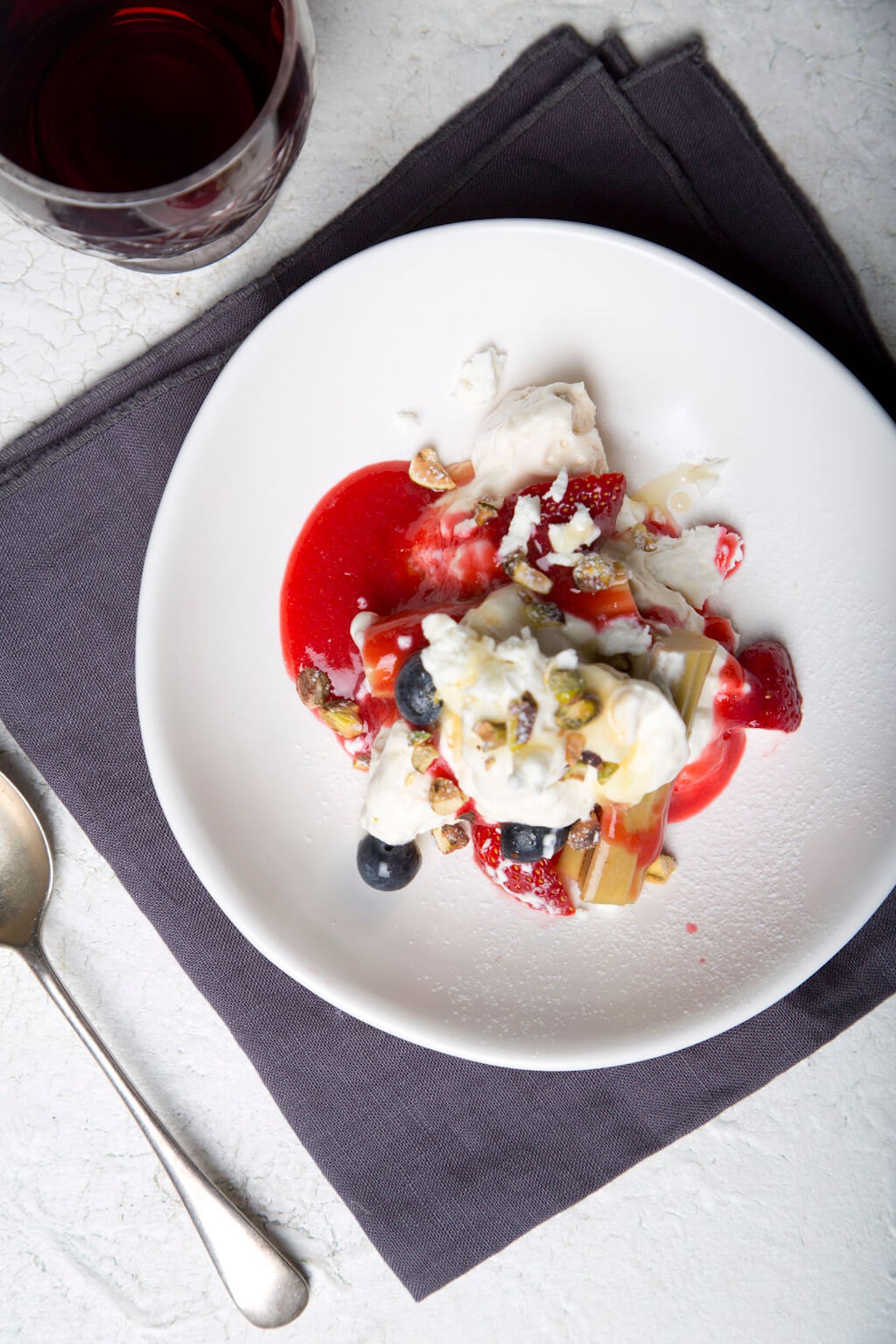 Persian Mess: smashed meringue with goat's curd, rhubarb and strawberries