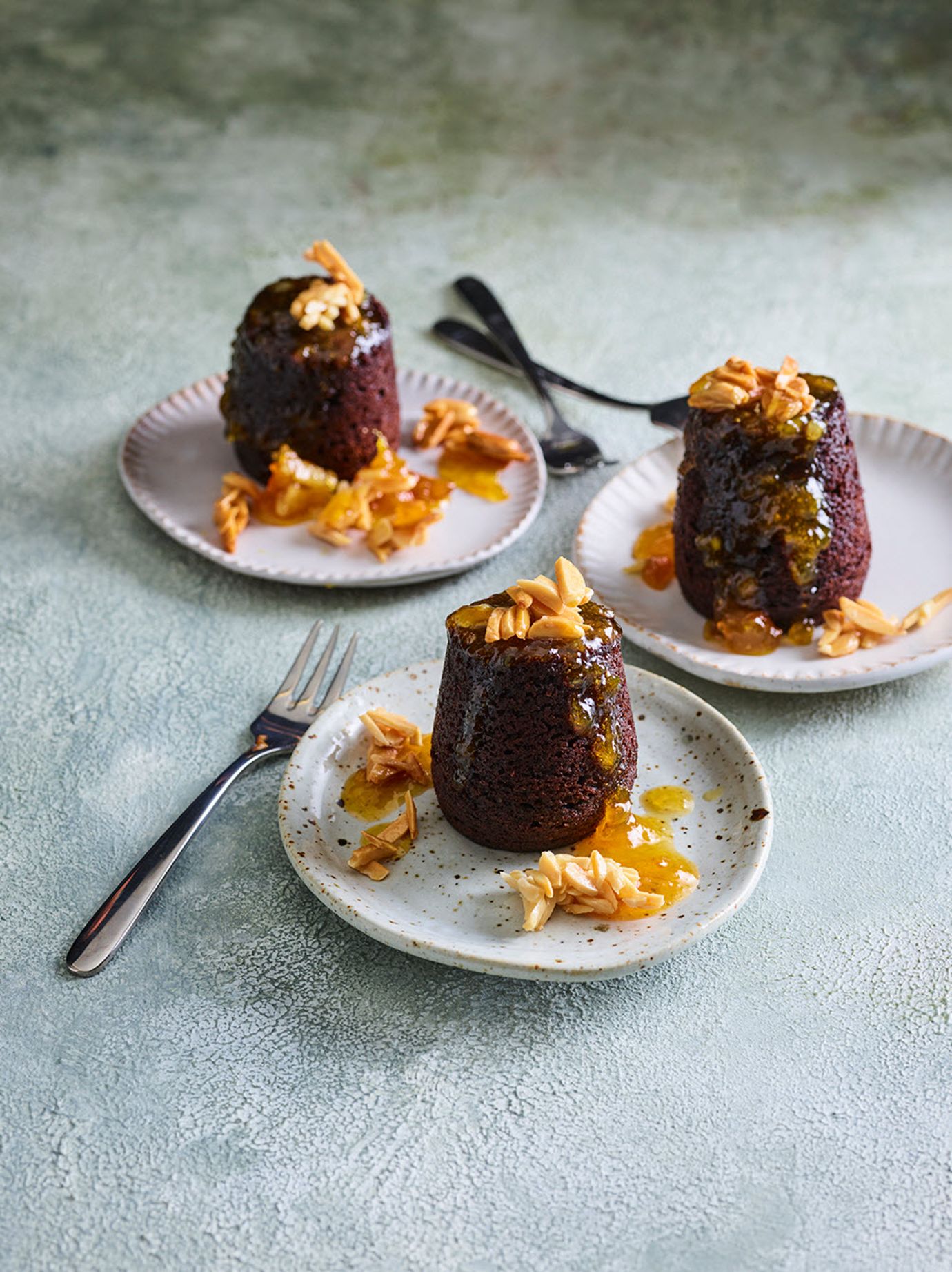 Steamed chocolate pudding with 'negroni' sauce