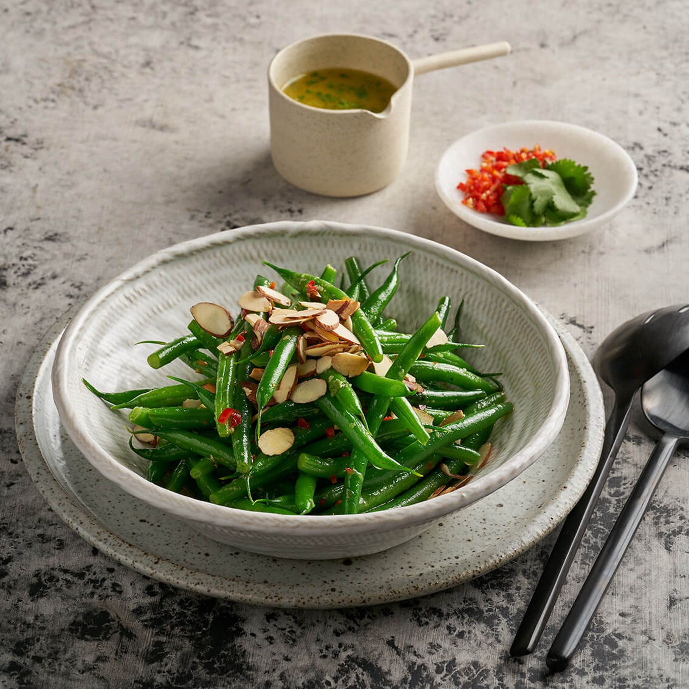 Warm salad of green beans, almonds and hot and sour dressing