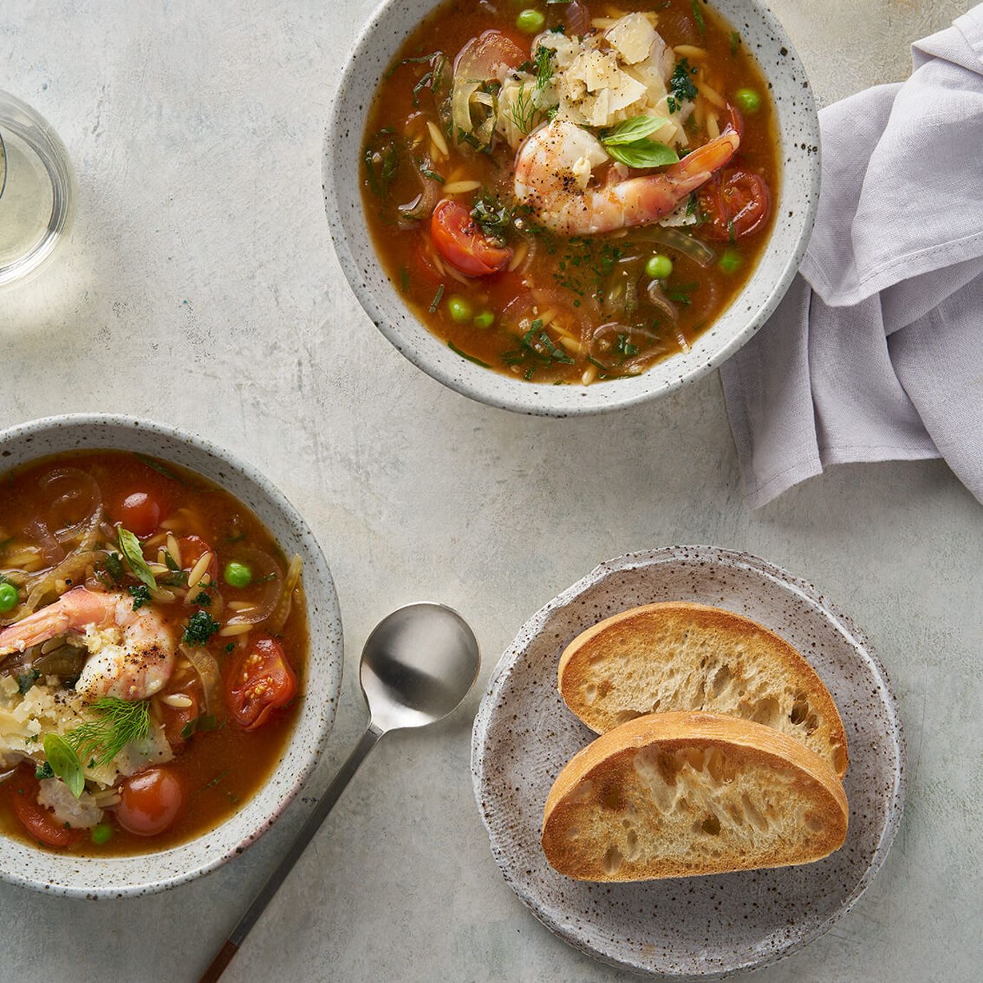 Spring minestrone with garlic lemon prawns