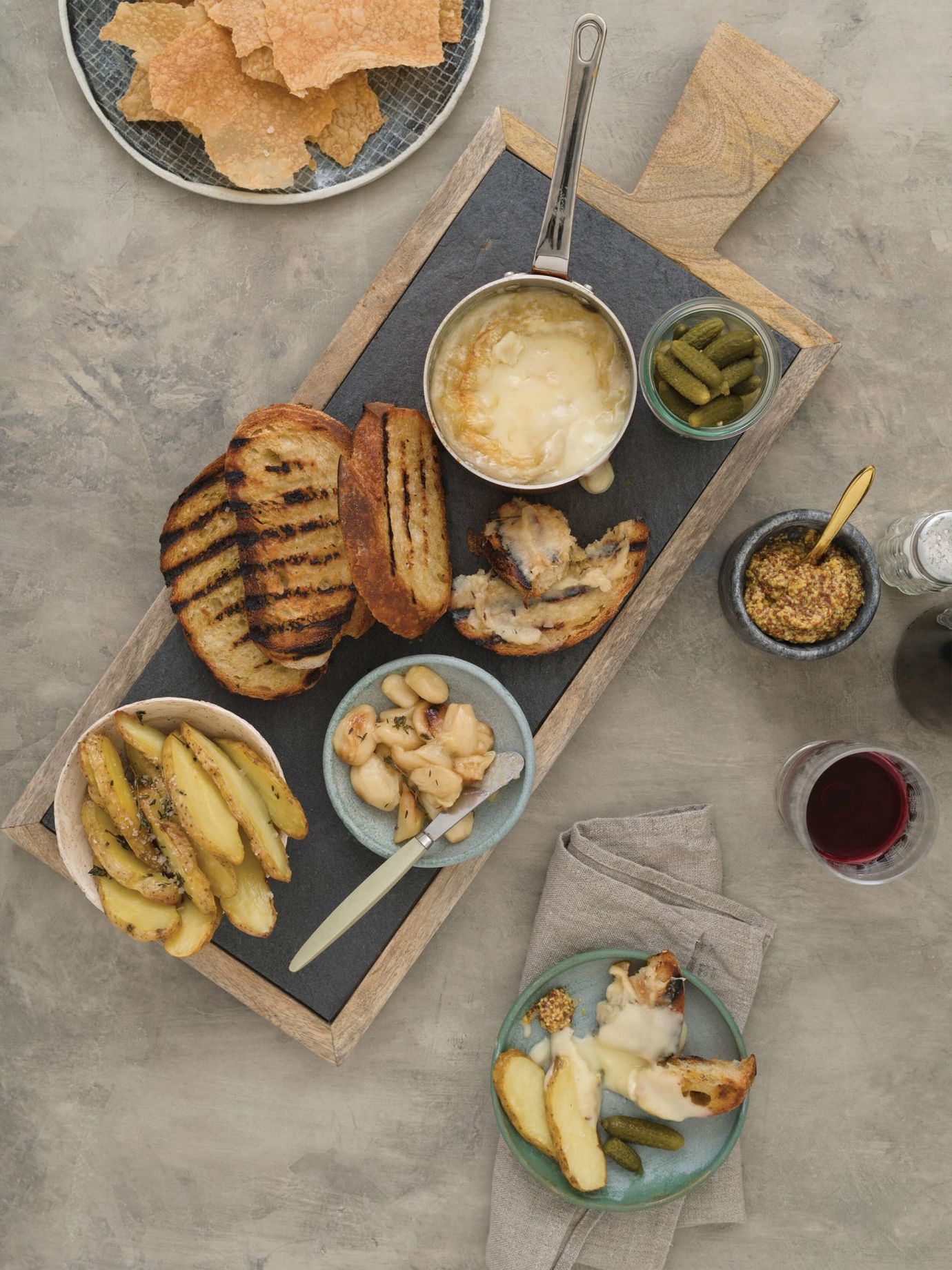 Baked cheese with confit garlic