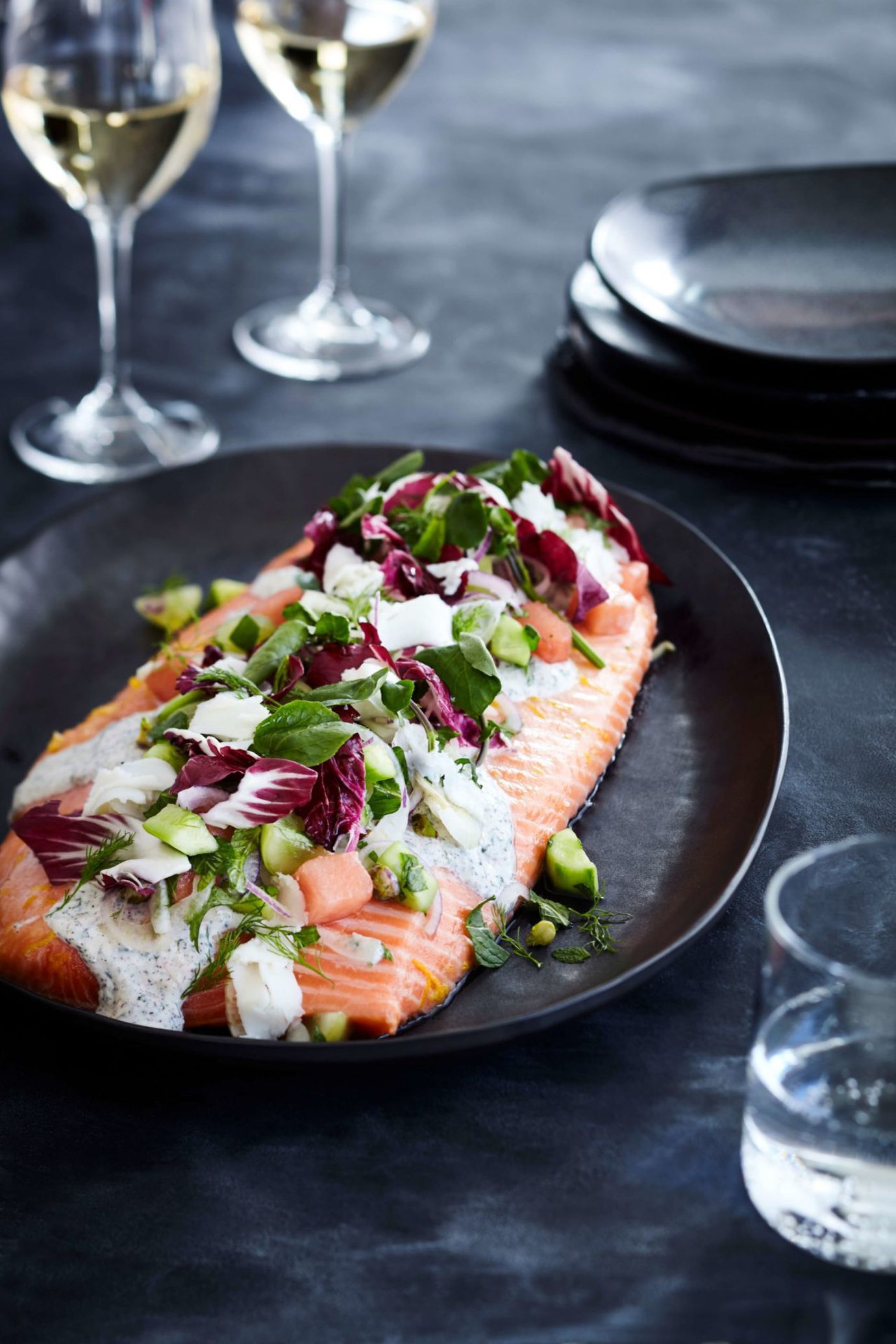 Slow baked king salmon, yoghurt dressing with melon and pomegranate salad