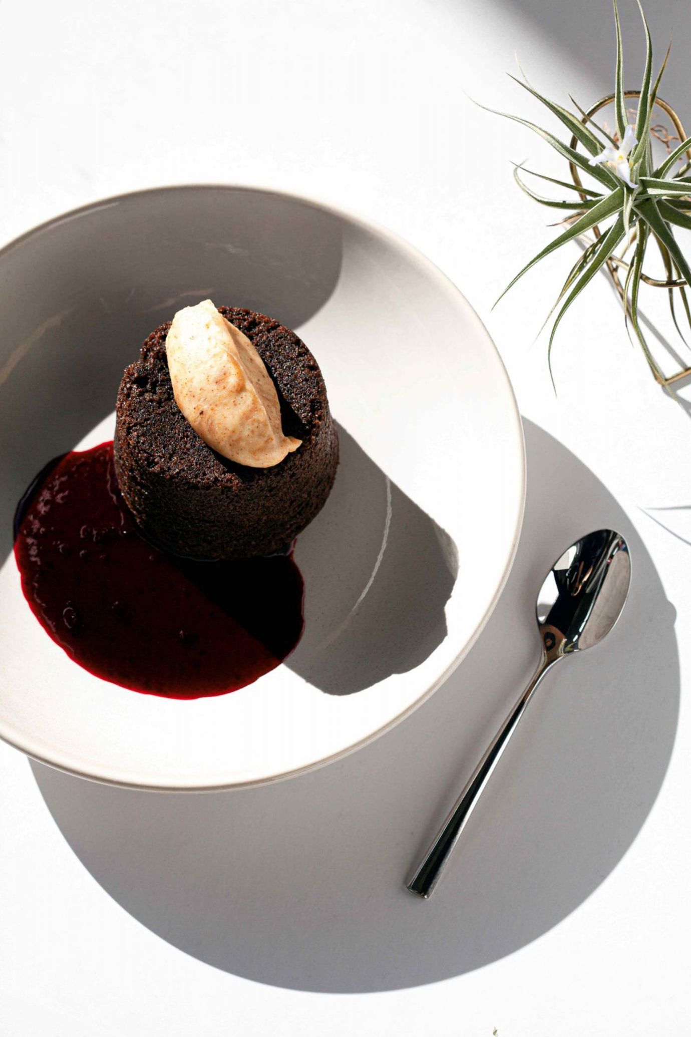 Chocolate steamed pudding with almond butter and blackberries