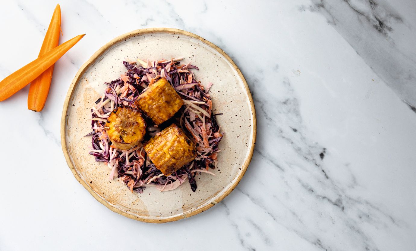 Corn grilled with hoisin glaze and coleslaw