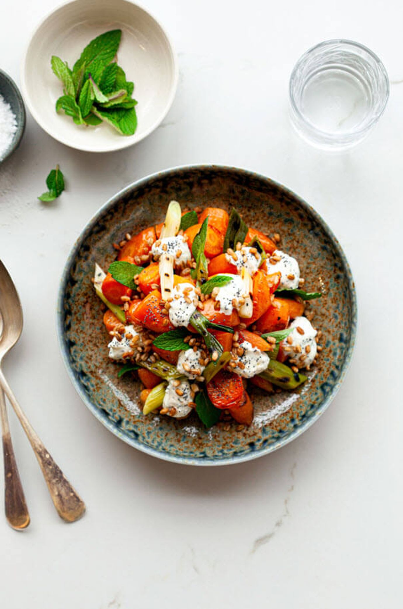 Carrots with makrut lime, charred spring onion, roasted barley and green chilli labna