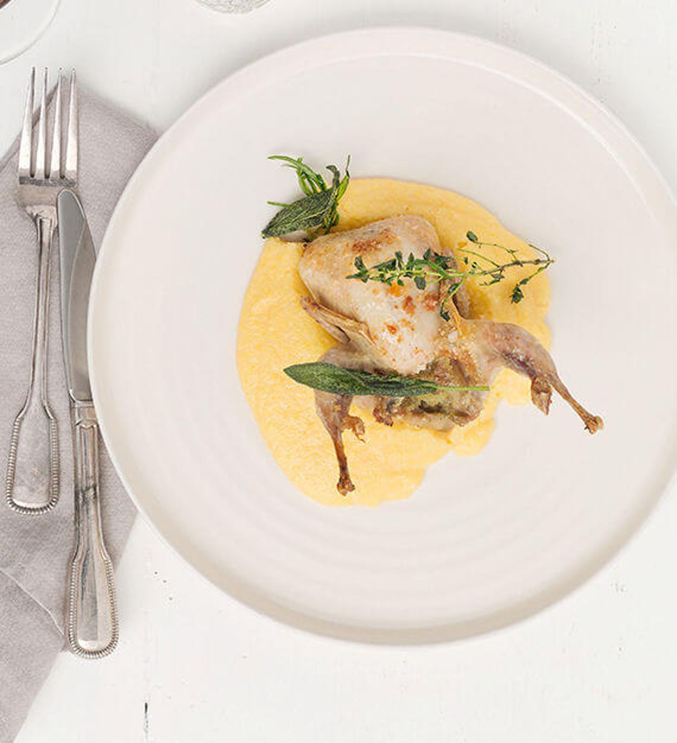 Local quail with sage and polenta