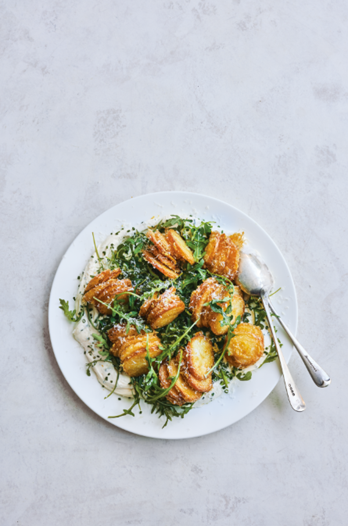 Crispy-parmesan-crusted-potato-and-rocket-salad-.png