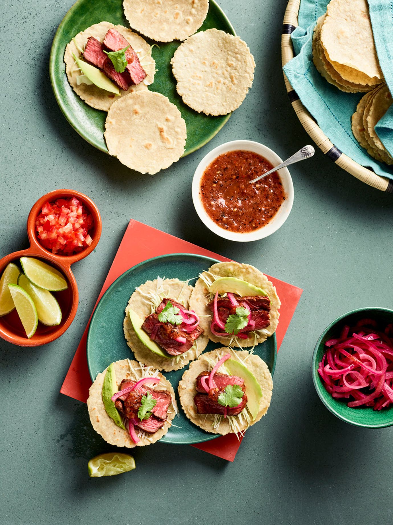 Carne asada tacos with charred tomato salsa and tortillas