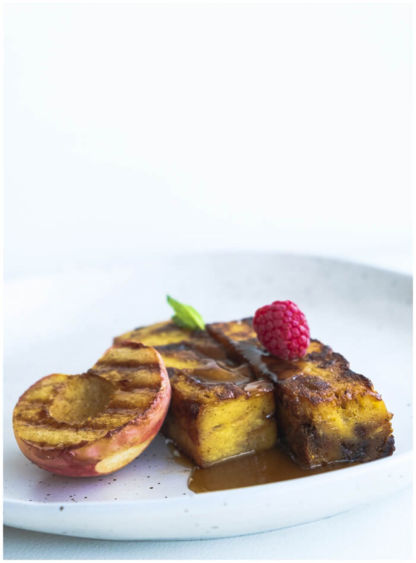 Panettone French toast with grilled peaches and caramel sauce