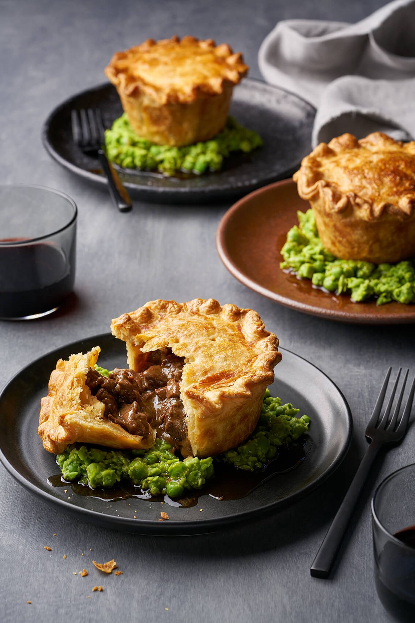 Beef and guinness pie with mushy peas