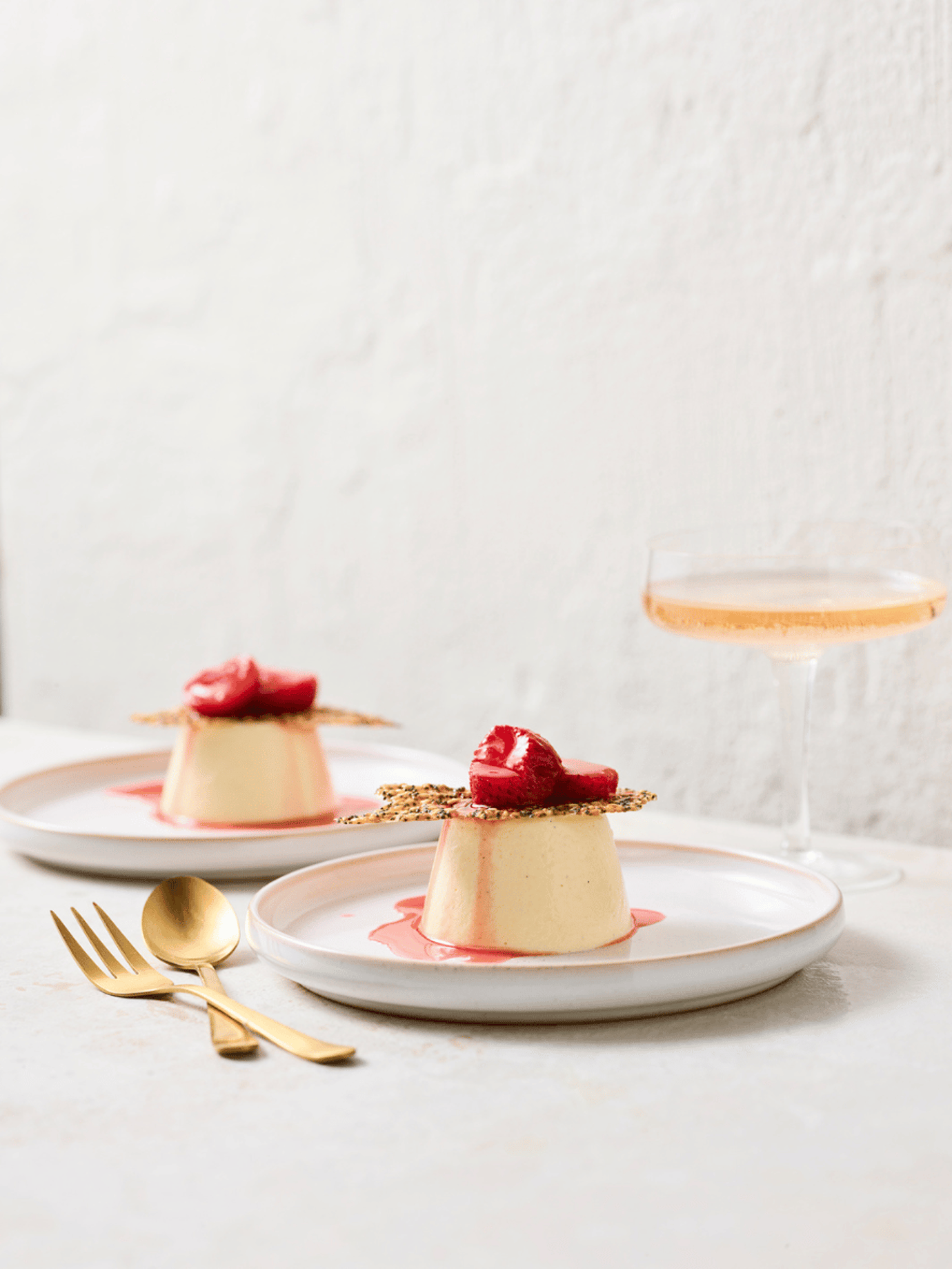 Vanilla panna cotta with sous-vide strawberries and sesame tuile