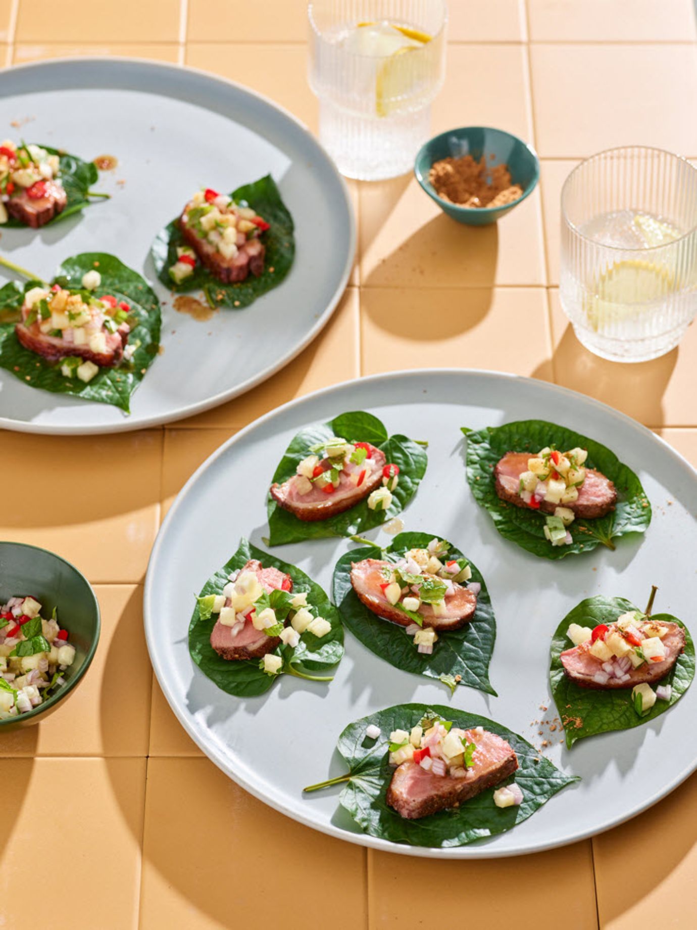 Betel leaves with sous-vide duck and pineapple