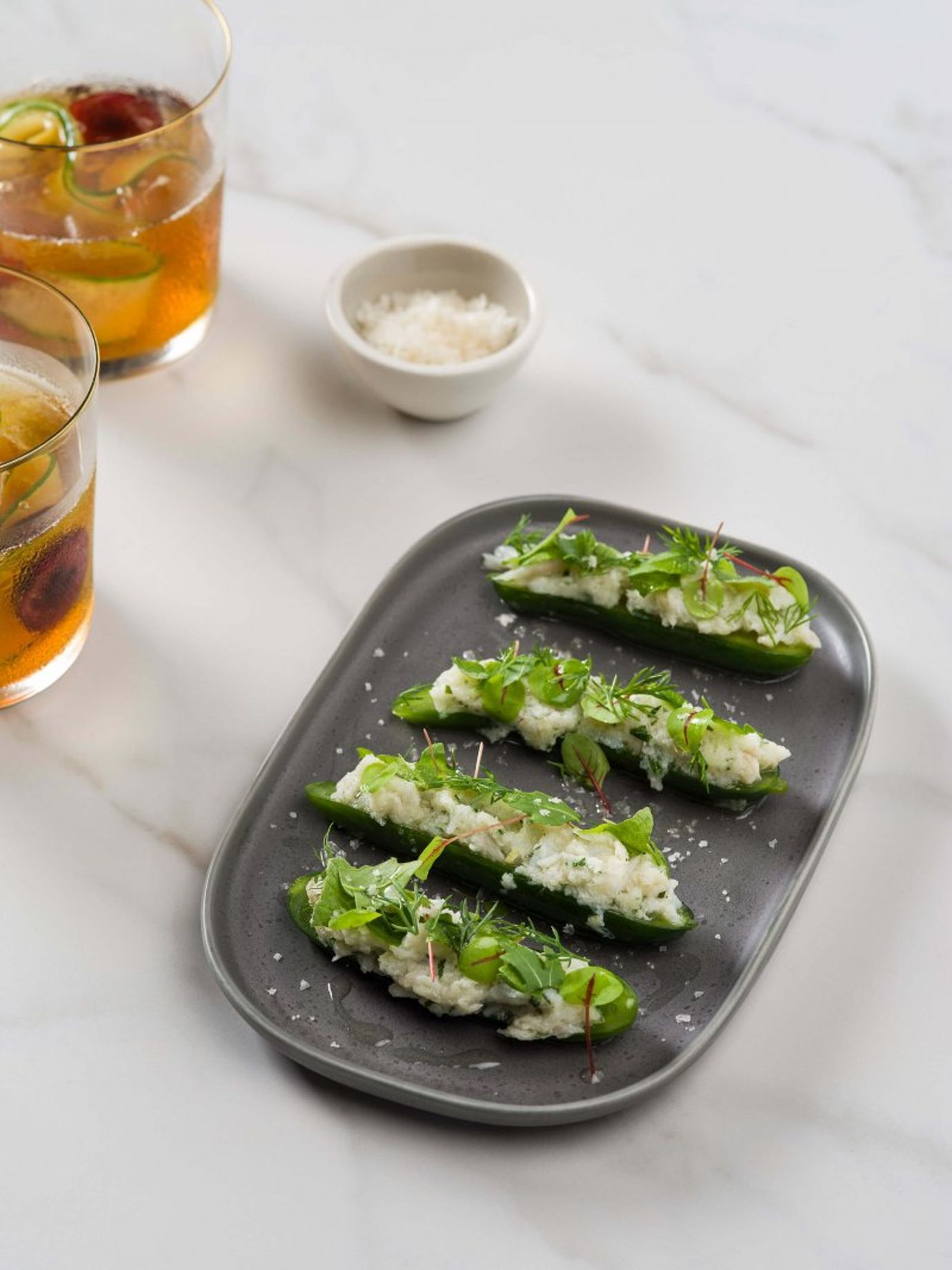 Compressed cucumber with salted fish brandade, wild herbs