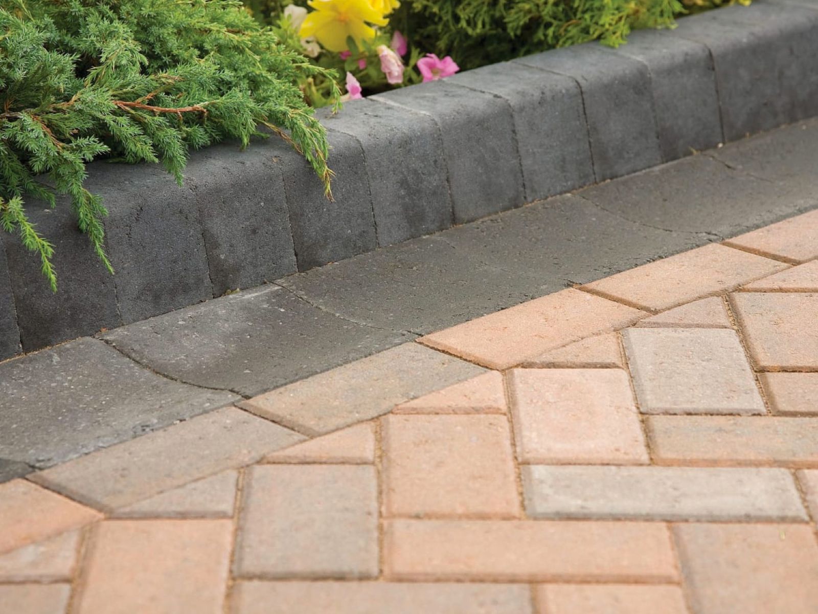 Marshalls Keykerb Half Battered Radial - Charcoal 100 x 127 x 200mm