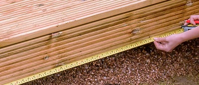 61.How-To-Build-A-Raised-Deck-Adding-fascia-board-Step-6.jpeg