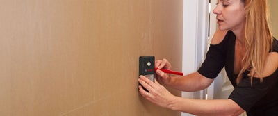 33.Airing_Cupboard_Marking_Holes_Fixing.jpeg