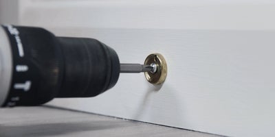 How_To_Replace_A_Door_Stopper_003.jpg