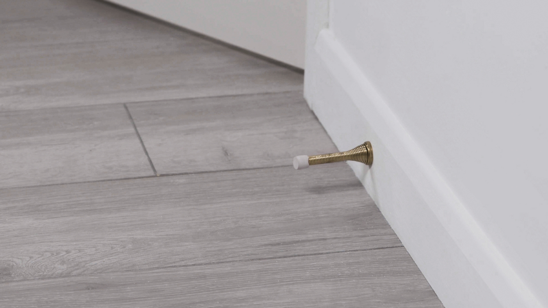 How_To_Replace_A_Door_Stopper_006.jpg