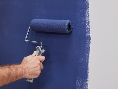 Paint roller on wall