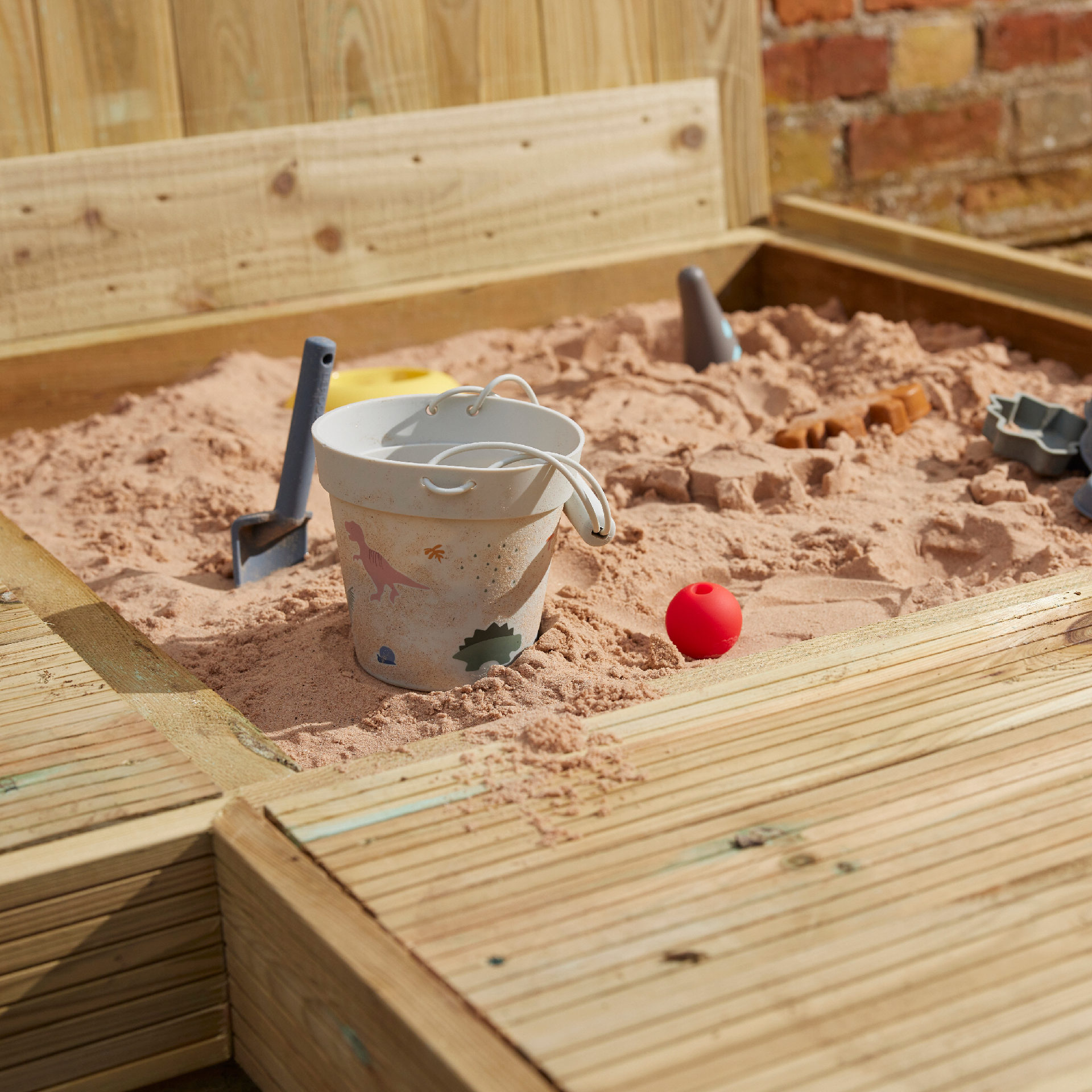 Modular decking with concealed sandpit