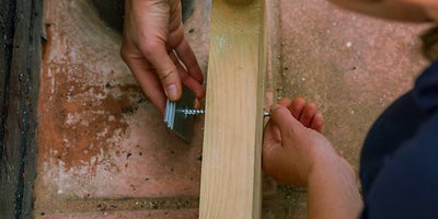 17.How-To-Lay-A-Deck-Adding-A-Wall-Plate15.jpeg