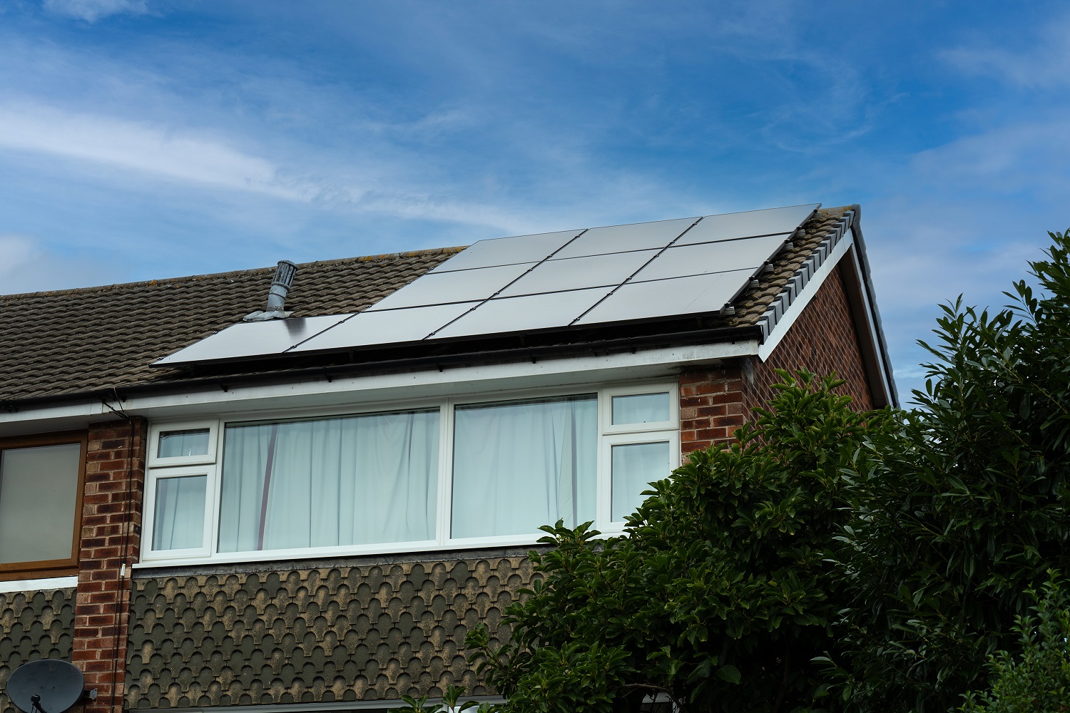 brown brick house solar panels.jpg
