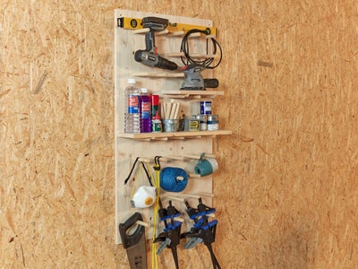 35._Collection_of_tools_stored_on_pegboard.jpg