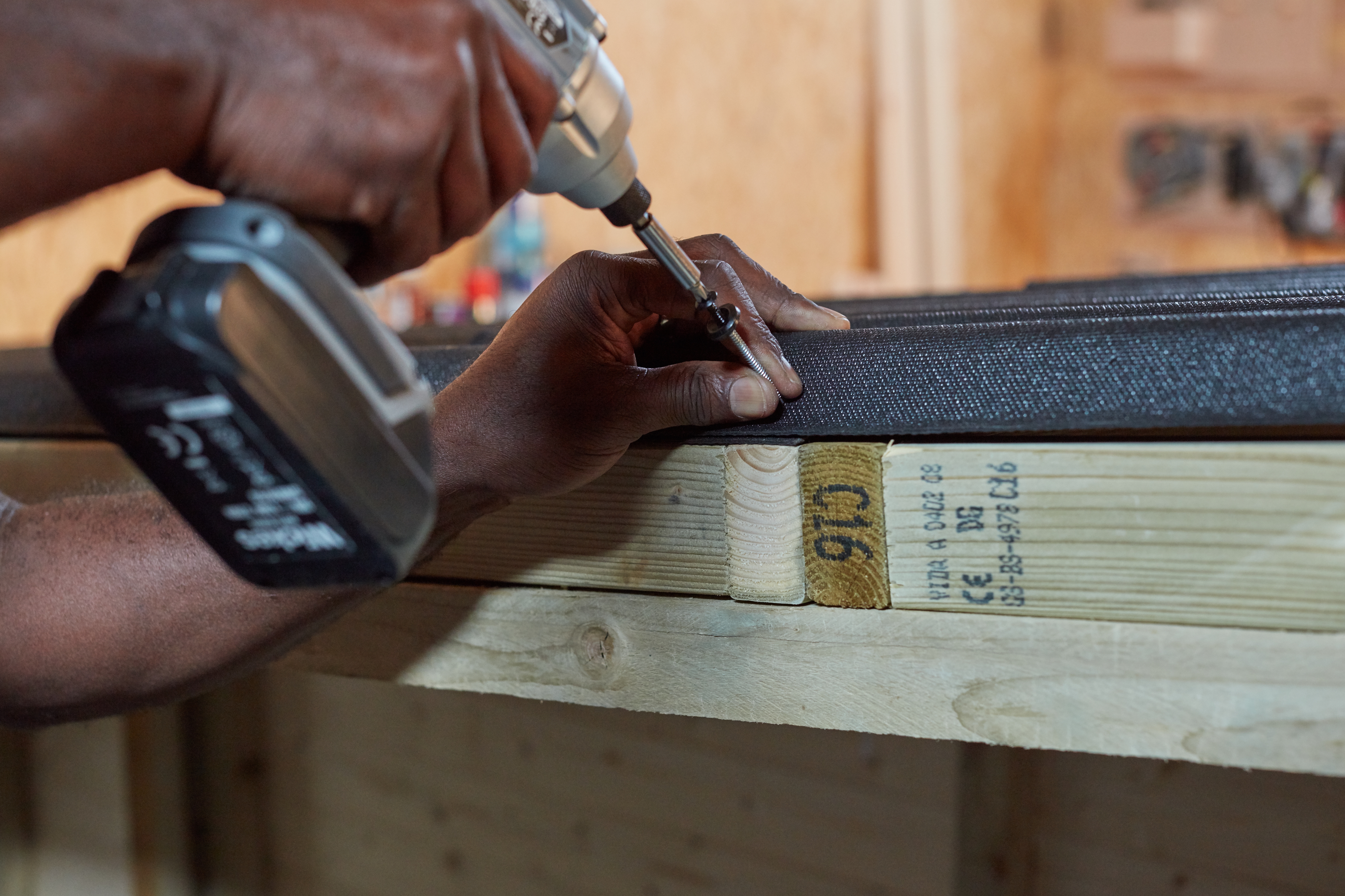 Screw roofing to structure