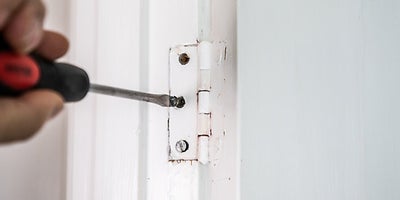 2.How-To-Fix-Door-Problems-Loose-Hinge.jpeg