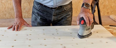 17._Sanding_timberboard_with_palm_sander.jpg