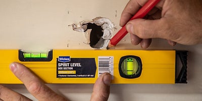 11.How-To-Repair-Walls-Small-Hole-4.jpeg