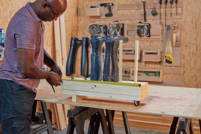 Measuring boot rack