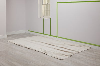 Cover the floor with a dust sheet
