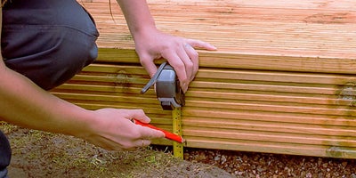 60.How-To-Build-A-Raised-Deck-Adding-fascia-board-Step-5.jpeg