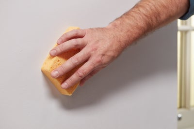 Wipe with a damp sponge