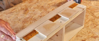 31.Applying_brackets_to_wooden_frame.jpeg